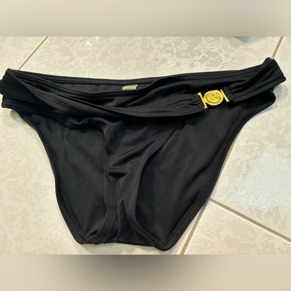 Selling all 3 together for $15 Victoria’s secret 34C swim top with 2 bottoms - Picture 4 of 8